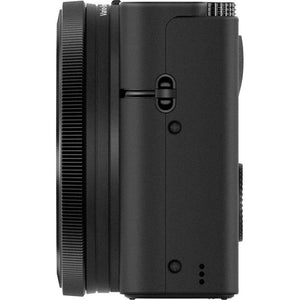 Sony Cyber-shot DSC-RX100 Camera DSCRX100/B With Soft Bag, Tripod, 2x Extra Batteries, LED Light, 2x 64GB Memory Card, Card Reader , Plus Essential Accessories