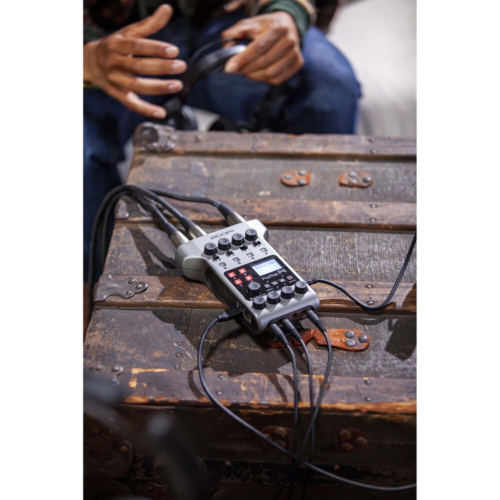 Zoom PodTrak P4 Podcast Recorder, Battery Powered, 4 Microphone Inputs, 4 Headphone Outputs, Phone and USB Input for Remote Interviews, Sound Pads, 2-In/2-Out Audio Interface Zoom