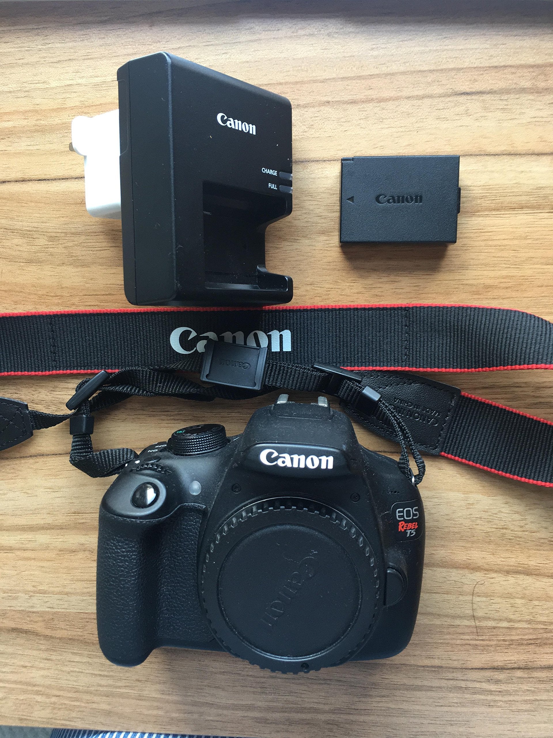 Canon EOS Rebel T5 Camera with New outlet Strap