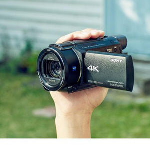 Sony FDR-AX53 4K Ultra HD Handycam Camcorder International Version With Extra Battery, Case, Memory Card Base Bundle Sony