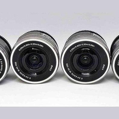 Sony SELP1650 16-50mm f/3.5-5.6 OSS Alpha Zoom Lens Silver Bulk packaging , International Version No Warranty