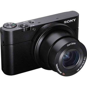 Sony Cyber-shot DSC-RX100 Camera DSCRX100/B With Soft Bag, Tripod, 2x Extra Batteries, LED Light, 2x 64GB Memory Card, Card Reader , Plus Essential Accessories