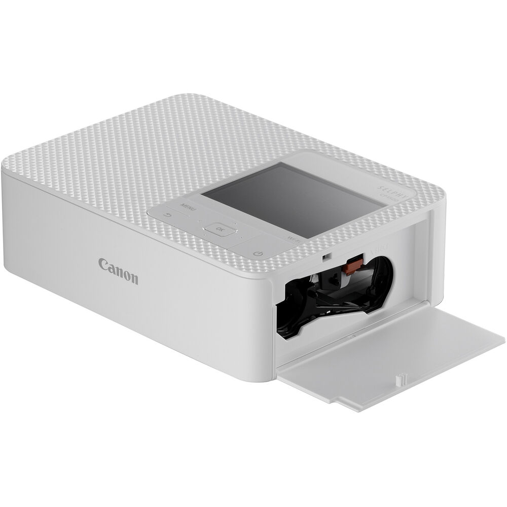 Canon SELPHY CP1500 Photo Printer (White) + Canon KP-36IP Color Ink and Paper Set + More Bundle